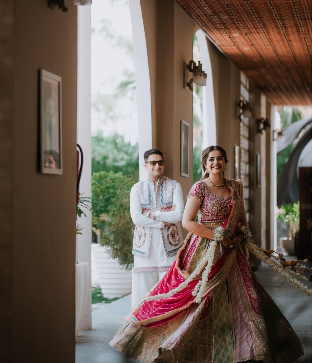 bride and groom first look moment in traditional Indian attire