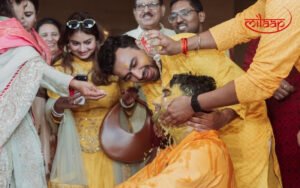Modern Mehendi and Haldi ceremony celebration with colorful décor and joyful wedding moments planned by Milaap Weddings